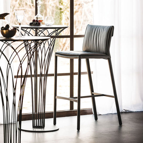 Black leather lorelei bar stool with sleek metal legs and modern minimalist design for stylish seating