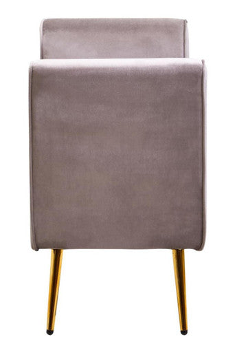 A modern mink velvet ottoman storage bench in soft gray velvet with sleek gold-tone legs for stylish seating and storage