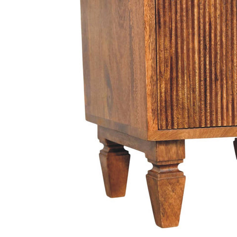 Rustic oak louvre bedside unit with fluted drawer fronts and turned legs made from solid mango wood