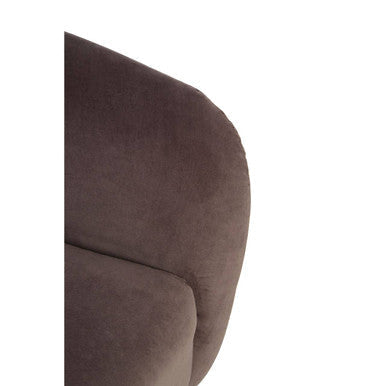 Brown suede armrest with soft plush texture and rounded contours on louxor grey velvet round velvet round armchair