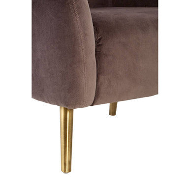 A plush mauve velvet round armchair with sleek gold-tone metal legs perfect for stylish living spaces