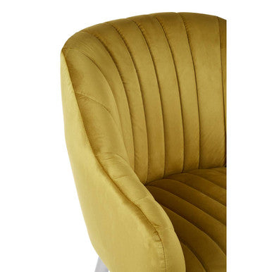 A louxor mustard fabric armchair in golden-yellow velvet with vertical pleats and a curved backrest
