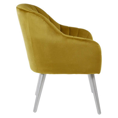 A louxor mustard fabric armchair in mustard fabric velvet with tufted back and sleek tapered chrome legs