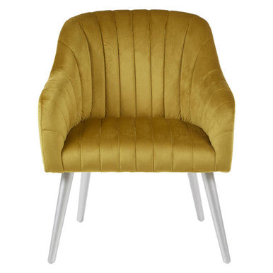 A louxor mustard fabric armchair in mustard yellow velvet with vertical pleats and slender metallic legs