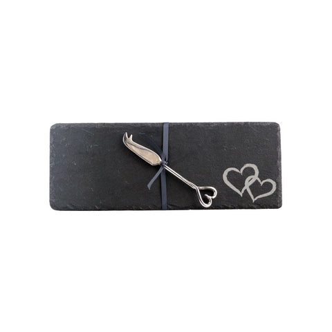 Dark gray mini slate cheese board with love heart engraving and silver cheese knife tied with navy ribbon