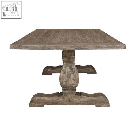 Weathered gray lovina recycled pine wood dining table with rustic distressed finish and ornate carved pedestal base