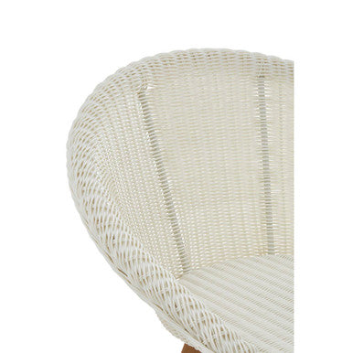 White rattan effect Lovina rattan effect dining chair with curved backrest and woven texture