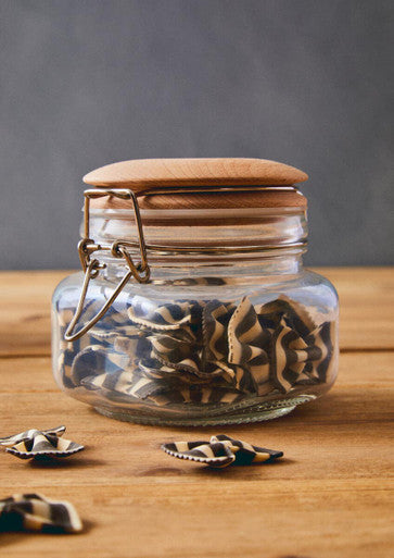 Clear glass luca square 500ml jar with wooden lid and metal clasp filled with black and white dried mushrooms