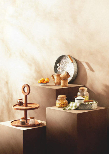 A rustic wooden three-tiered serving stand with natural wood grain finish paired with luca square 800ml glass jar