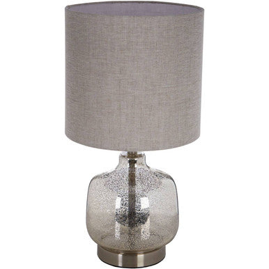 Lucia table lamp with a sleek textured glass base in metallic finish and a soft gray linen shade