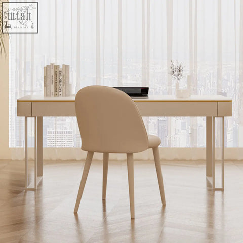 Beige upholstered chair with slender tapered legs paired with white lucien office desk for a stylish office desk setup