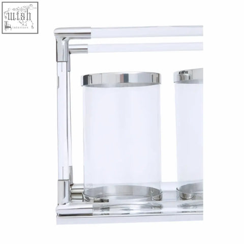Lucita double silver steel candle holder with chrome-finished acrylic and polished metal accents in sleek modern design
