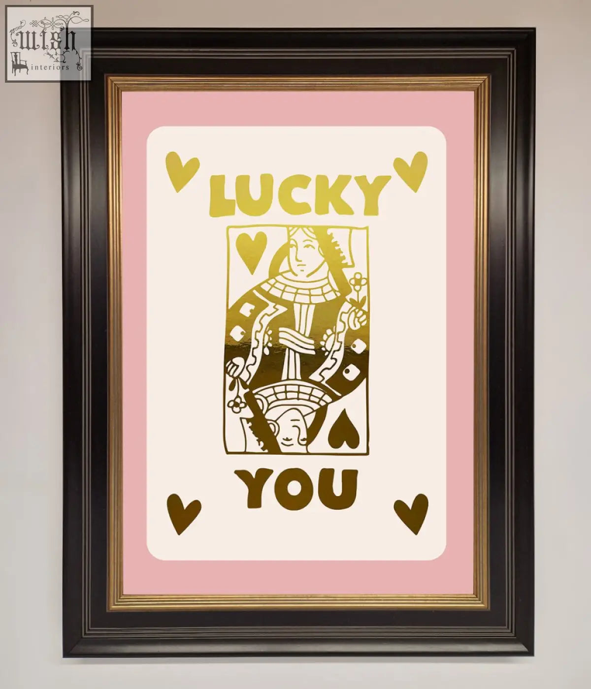 A lucky you foil print featuring a queen of hearts design in gold foil on pink with a black and gold frame, fast shipping times