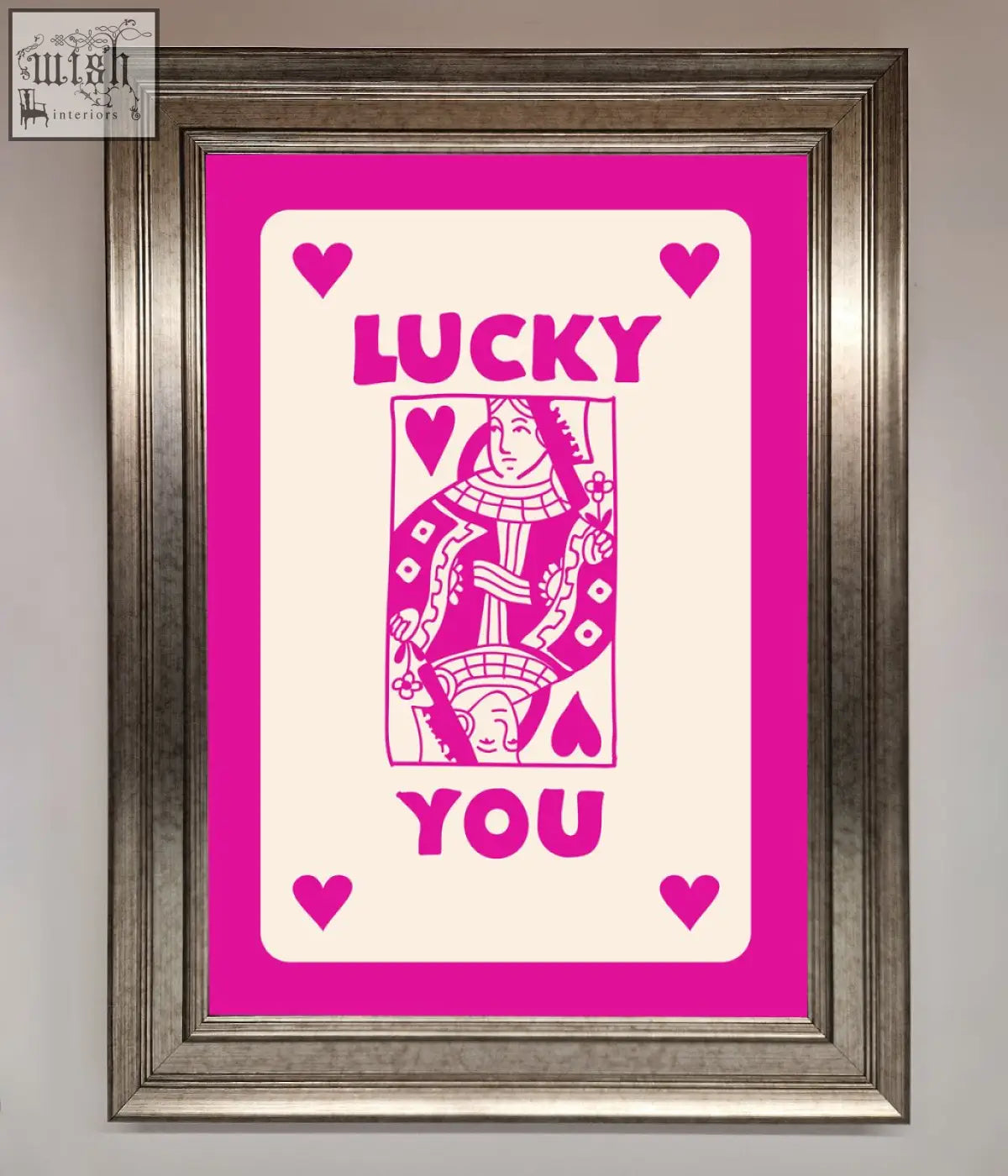 A hot pink framed pink framed poster featuring a vibrant lucky you stylized playing card design in cream and pink