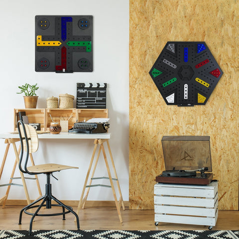 Black hexagonal ludo wall game with colorful segmented paths and holes for gameplay and hanging instructions
