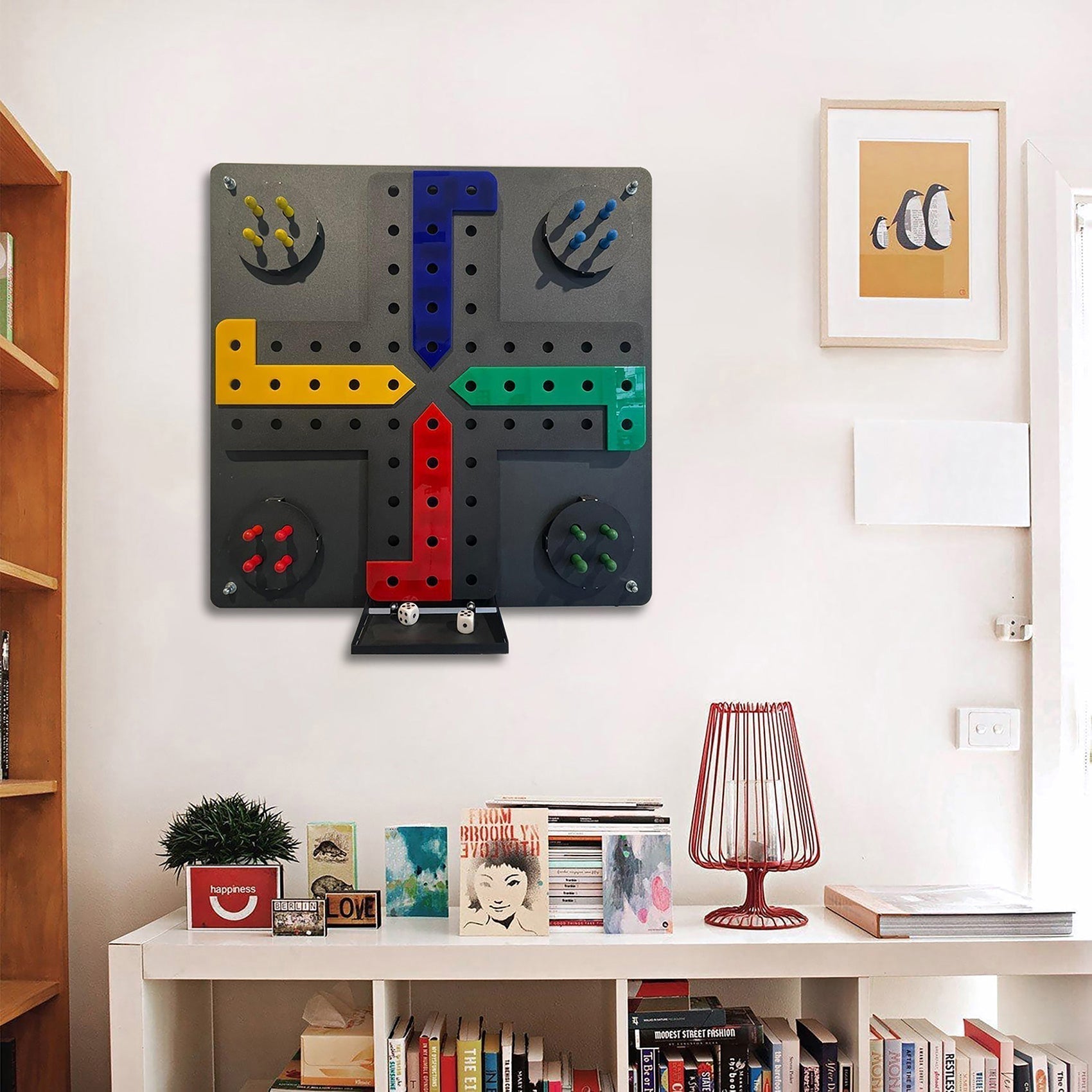 Gray wall-mounted ludo wall game board with colorful raised yellow blue green and red pathways and hanging instructions