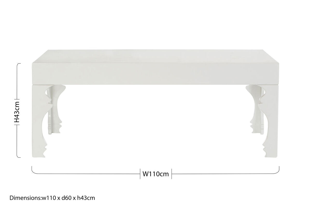 White high gloss coffee table with ornate carved legs and smooth gloss finish ideal for stylish living rooms