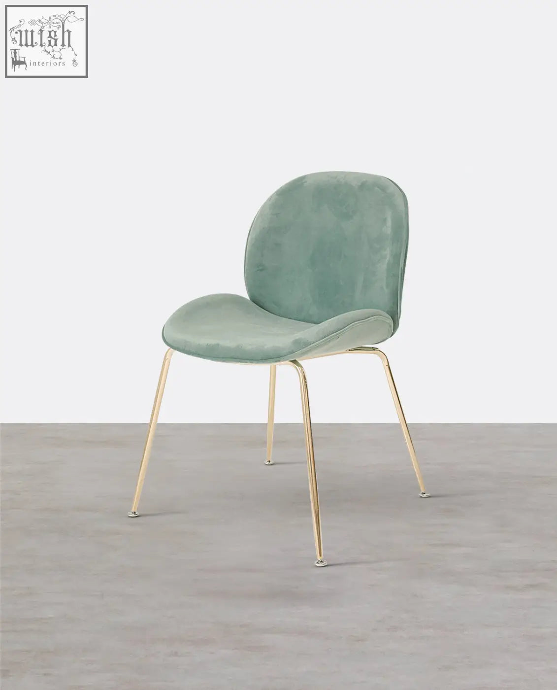 Mint green velvet lule dining chair with slender gold metal legs perfect for stylish dining spaces