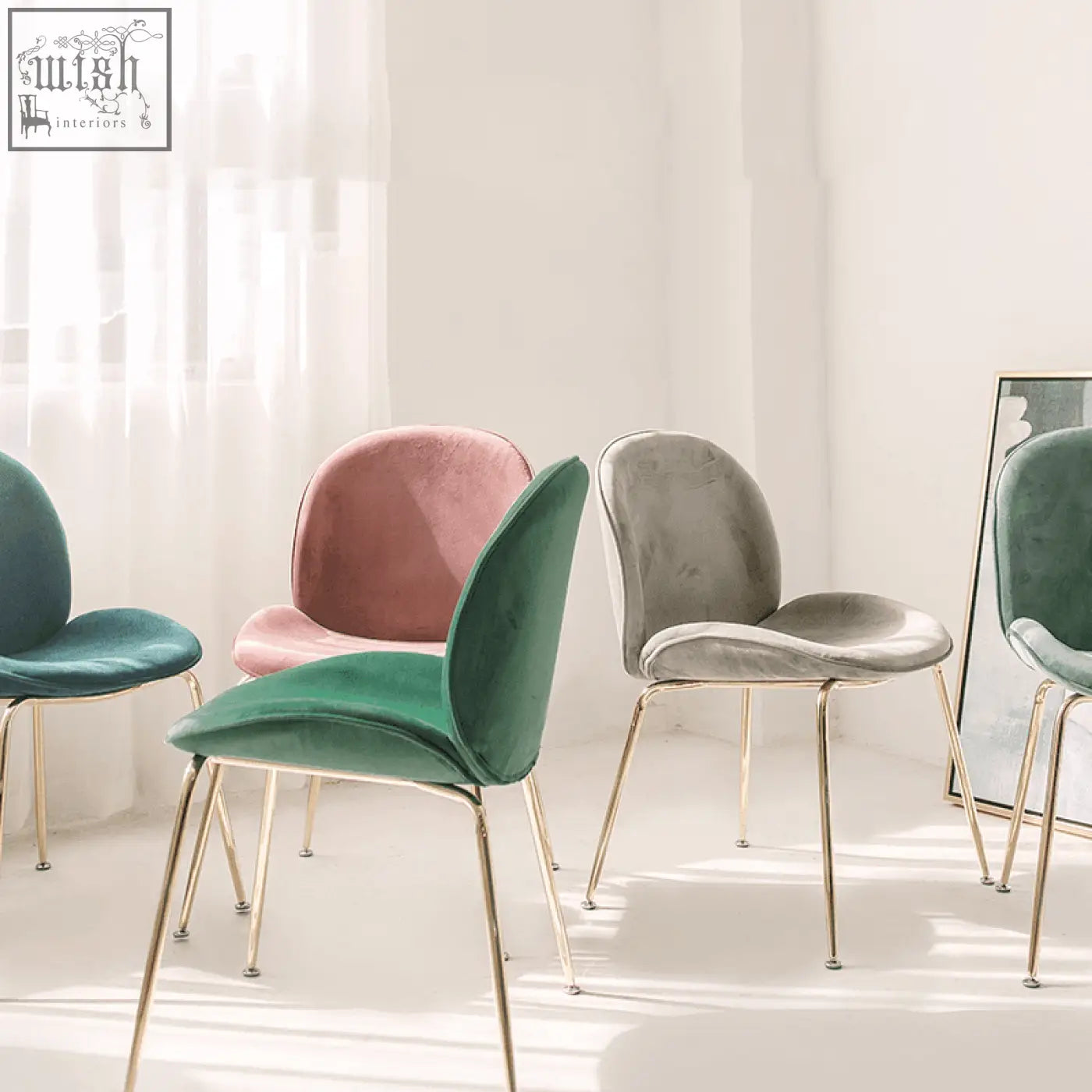 Modern velvet lule dining chair in soft pastel hues with sleek gold metal legs and a plush rounded design