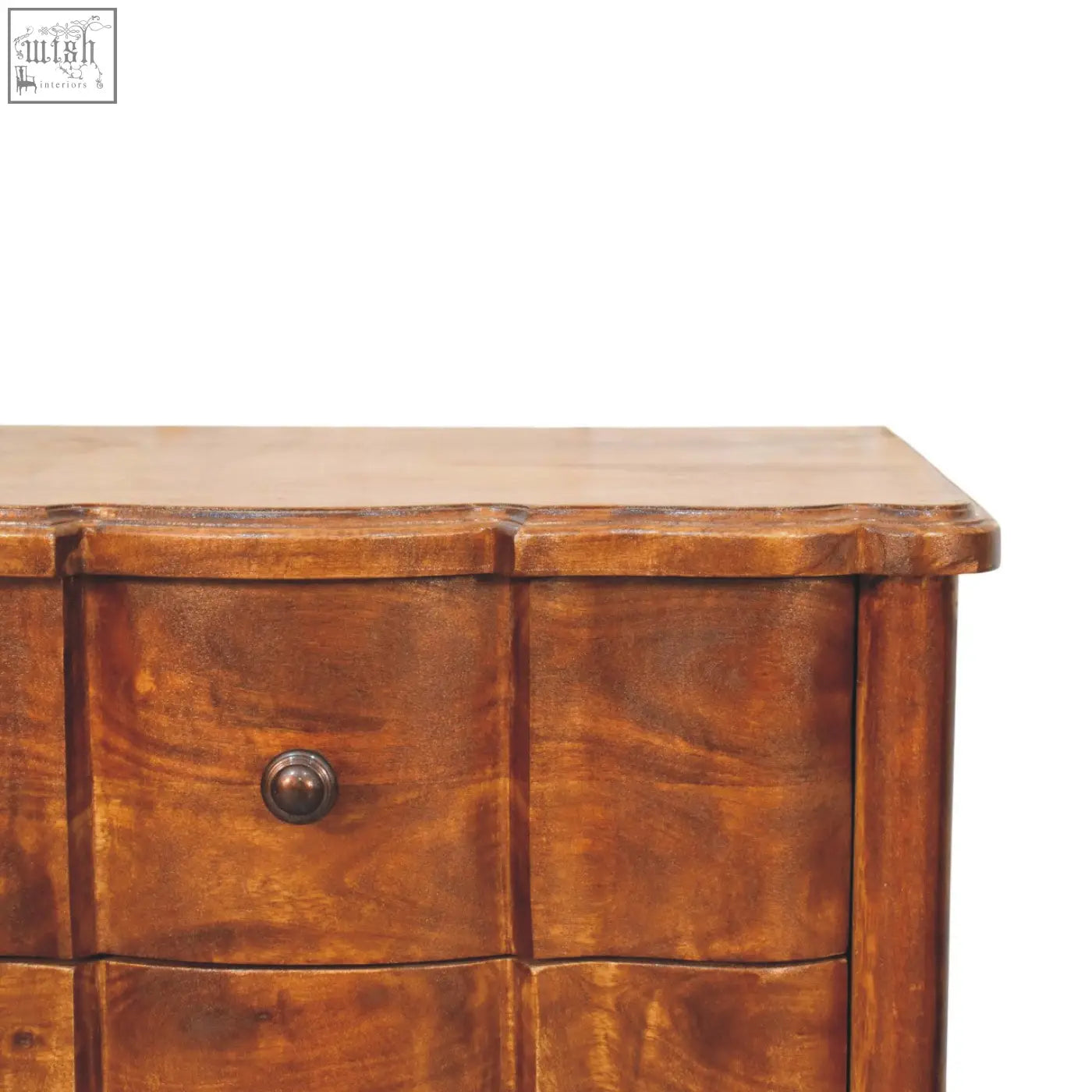 Antique style wooden bedside table with warm brown finish and curved drawer fronts for bedroom use