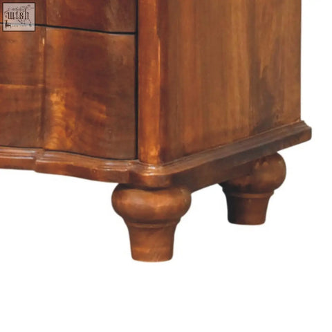 Antique-style wooden bedside table with rich warm brown finish and carved ball and claw feet in lume panel style