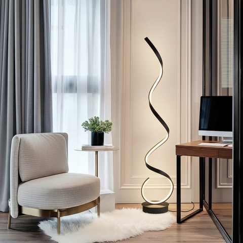 Modern black and gold led floor lamp with a sleek sinuous design perfect for minimalist lighting setups