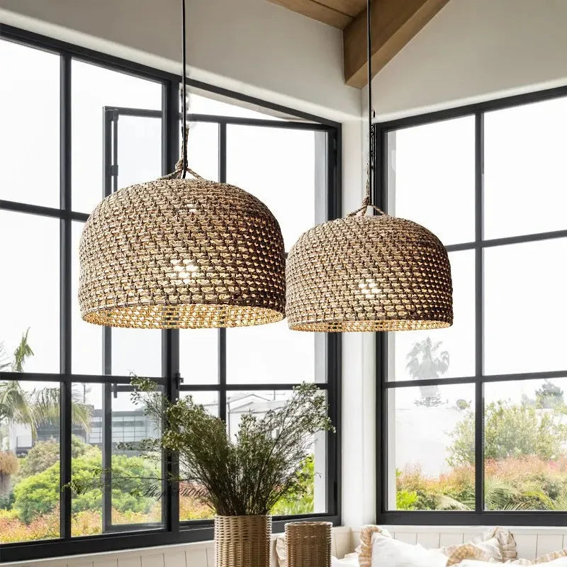 Two woven wicker luna light pendant lights in natural earthy brown with intricate basketweave pattern
