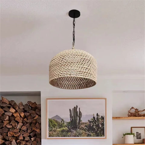 Beige woven rattan luna light pendant light with black chain and ceiling mount perfect for cozy spaces