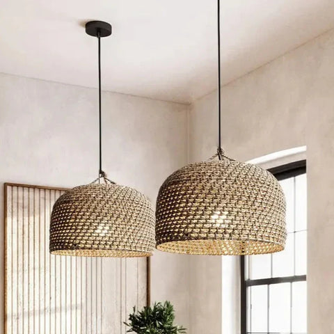 Two woven rattan pendant lights in natural beige with intricate patterns perfect for cozy luna light decor