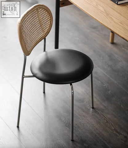 Oak luna dining chair with black upholstered seat woven cane rattan backrest and slim metal legs dining chair