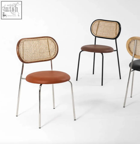 Brown leather luna dining chair with woven rattan frame and chrome legs perfect as a stylish dining chair