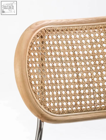 Light wood framed luna rattan dining chair with natural woven rattan backrest perfect for rattan dining spaces
