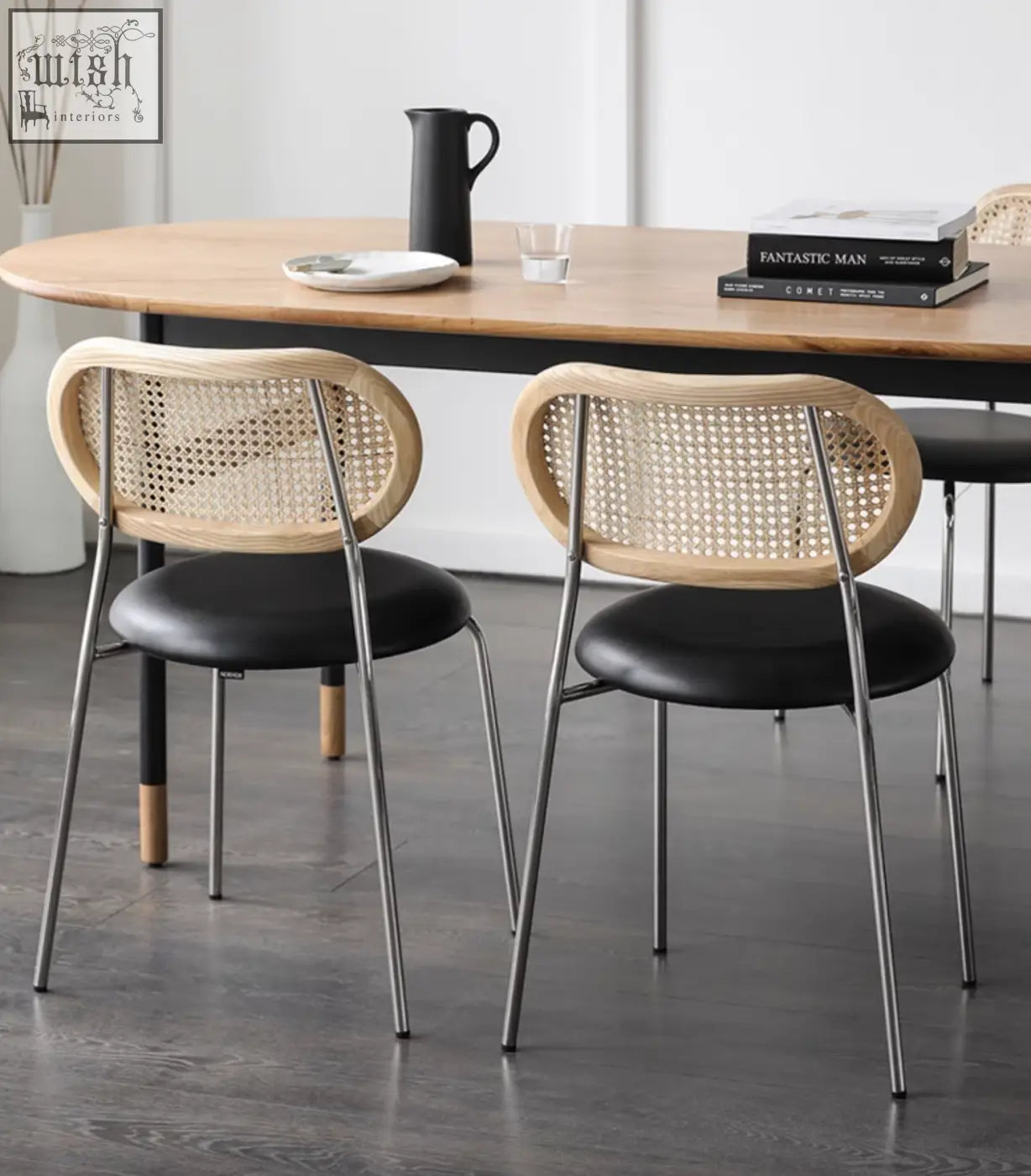 Modern luna dining chair with black leather seats, oak wood frame, and woven rattan back for stylish dining spaces