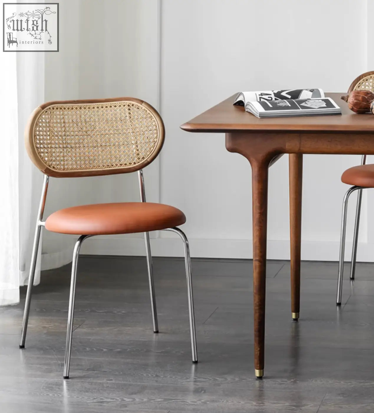 Modern luna dining chair with woven rattan back, brown leather seat, and chrome legs for stylish dining room seating