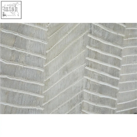 Gray textured rug with herringbone pattern next to luxor 4 door sideboard made of door recycled pine wood