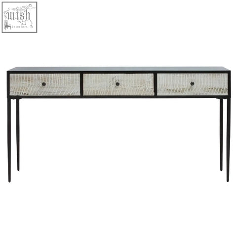 Black-framed luxor three drawer rectangular console table with textured light gray mirrored finish and round black knobs