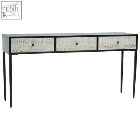 Black metal luxor three drawer rectangular console table with textured light surface and round drawer knobs