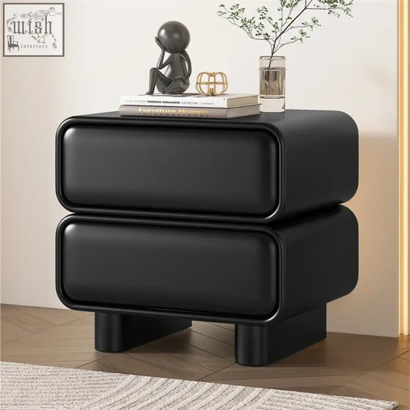 Black leather bedside table with two drawers and rounded edges featuring solid wood and moroccan design details