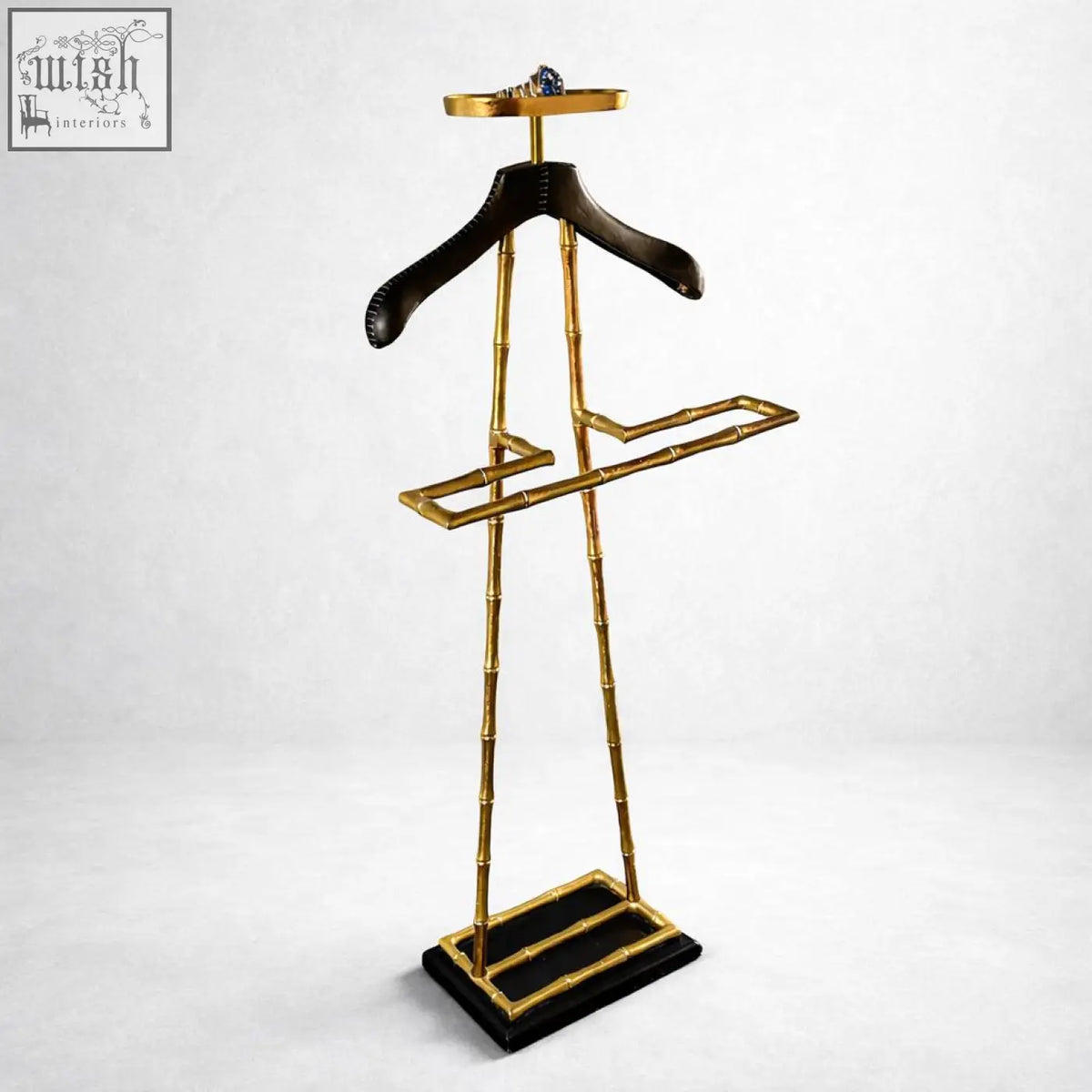 Golden bamboo-style vintage brass dressboy with black leather shoulder pad coat hanger and matching base for suits and coats