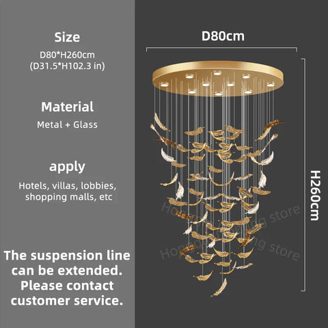 Gold-toned luxury glass led chandelier with circular metal frame and dangling glass panels shaped like feathers