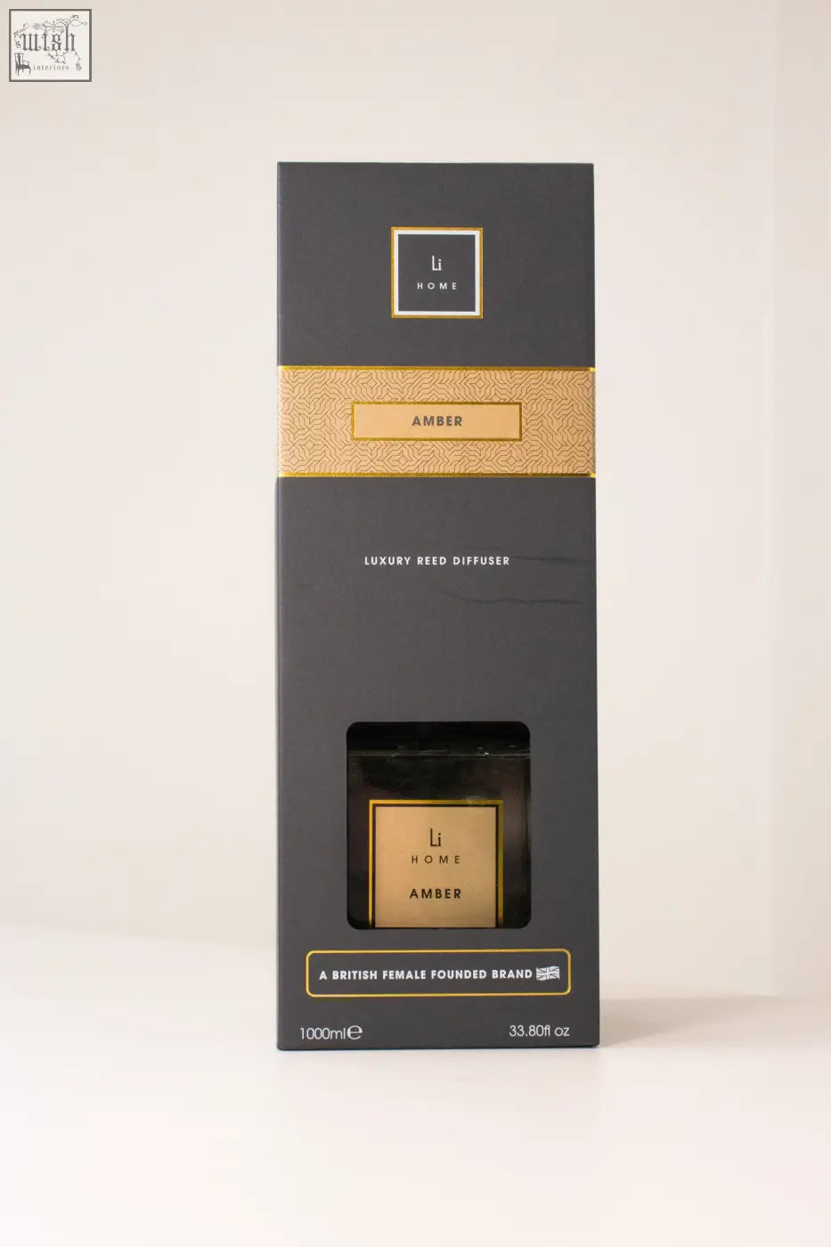 Black and gold luxury square reed diffuser with amber scent in a sleek rectangular box by li home