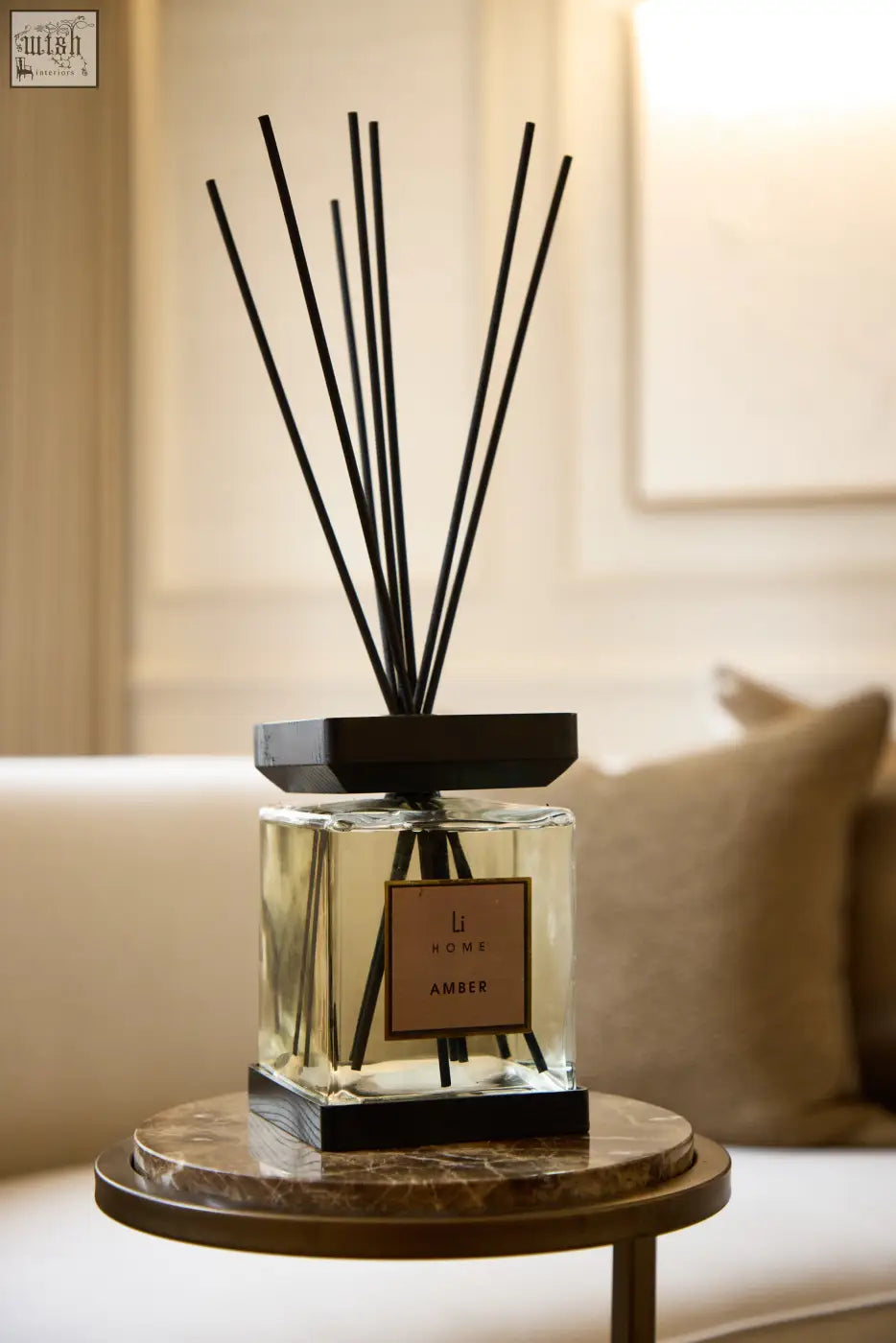 Clear glass luxury square diffuser amber with black reeds and modern design featuring li home amber label