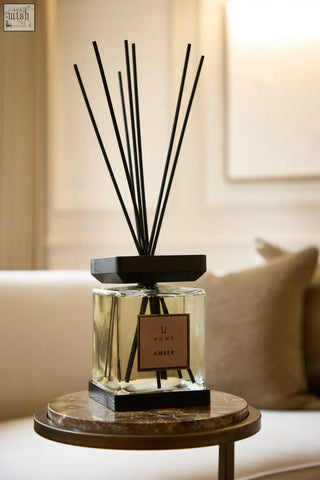 Clear glass luxury square diffuser amber with black reeds and modern design featuring li home amber label