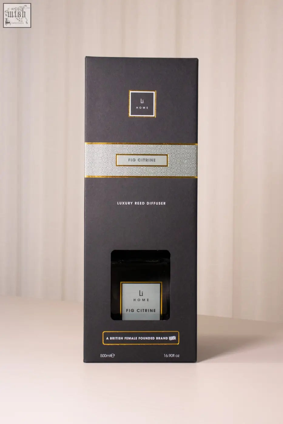 Black rectangular box with luxury square diffuser featuring fig citrine scent and gold foil accents in minimalist design