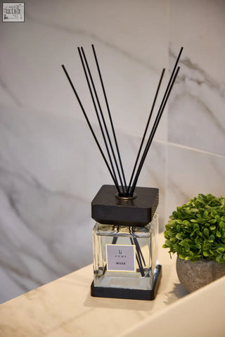 Luxury square diffuser musk with black square base and clear glass bottle labeled li home musk for home fragrance