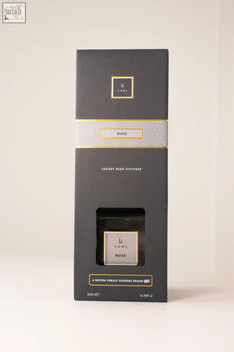 Black rectangular luxury square diffuser with gold accents and musk scent in a sleek reed diffuser box
