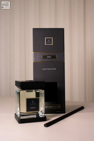 Black glass reed diffuser with sleek square bottle and matching black base luxury square diffuser sable