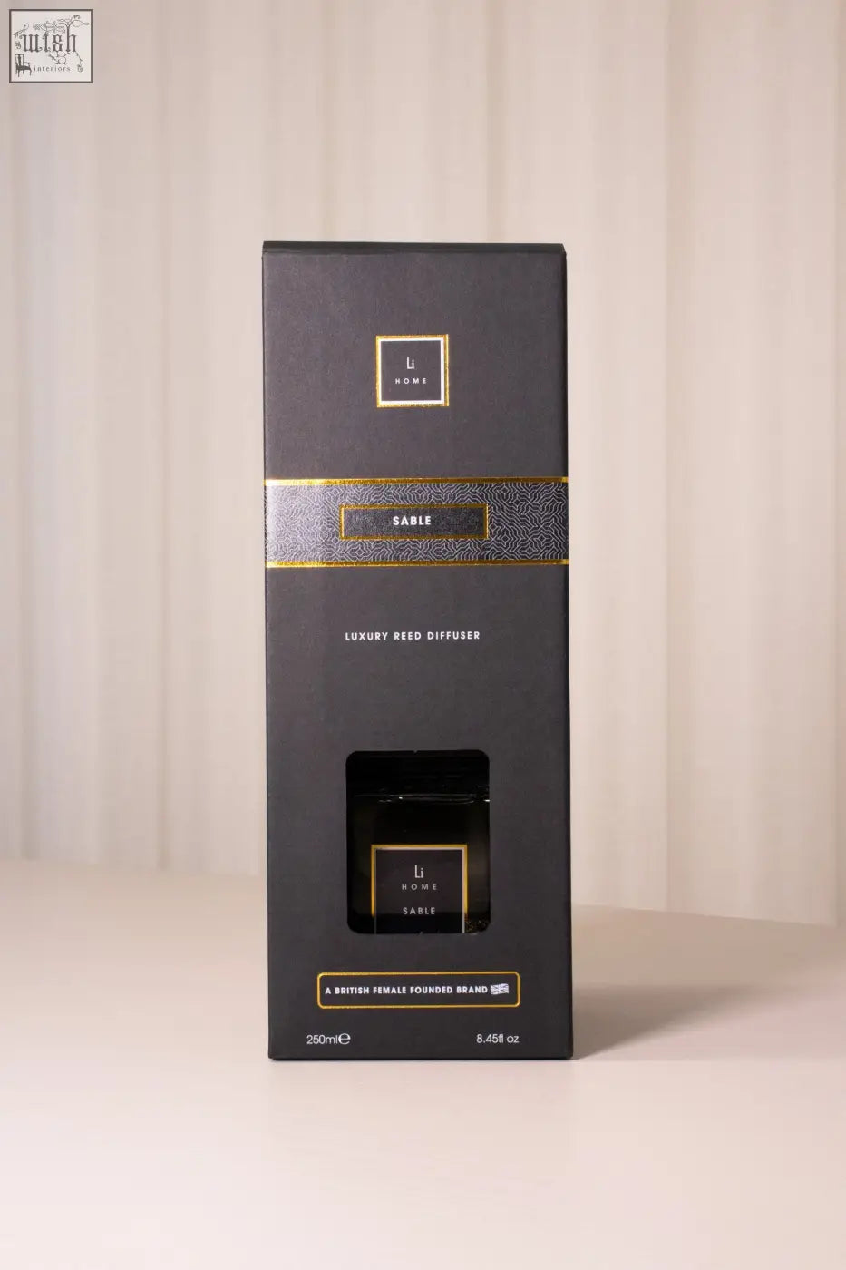 Black luxury square reed diffuser sable with sleek gold-accented packaging and glass bottle for home fragrance