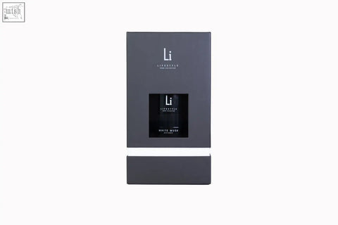Black rectangular box with white stripe and li lifestyle branding holding a white musk luxury xxl room diffuser