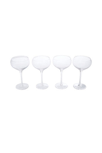 Four clear stemmed cocktail glasses with rounded bowls and flat bases from the lyle set for stylish serving